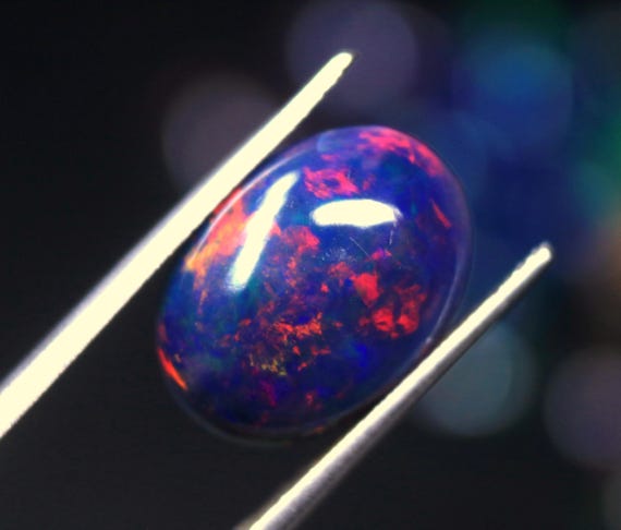 3.55 CT Oval Black Opal Cabochon: Ethiopian Welo Gemstone