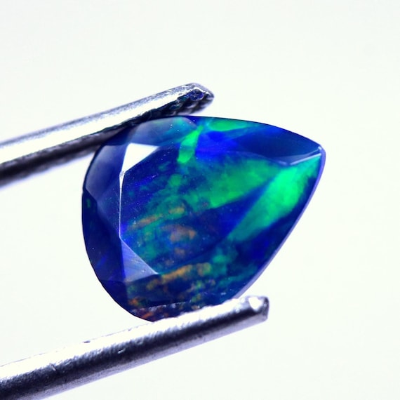 Ethiopian Welo Opal: 0.75 CT Pear Faceted Loose Gemstone
