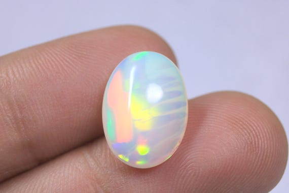 Natural Fire Opal Cabochon: 5.25 Carat Rainbow Ethiopian Loose Opal Gemstone For Making Jewelry