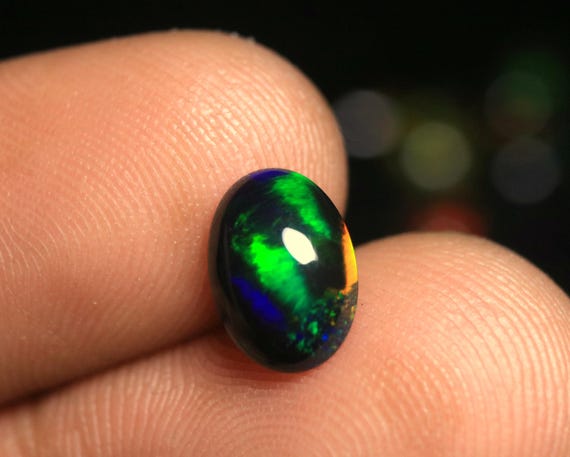 1.10 CT Ethiopian Black Opal Cabochon, Oval Natural Stone, Flashy Welo Opal Gemstone