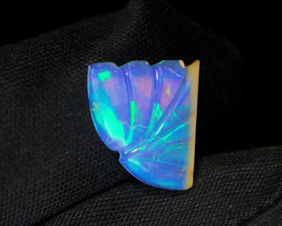 Carved Ethiopian Opal Gemstone: AAA Grade Multi-Fire, 1.60 CT