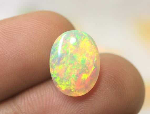 Natural Fire Opal Oval Cabochon: 3.85 CT Multicolor Jelly Opal Loose Gemstone For Jewelry