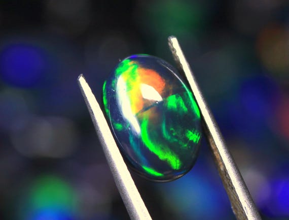 1.85 CT Ethiopian Black Opal Cabochon: Flashy Fire Gemstone