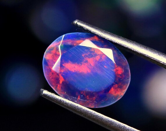 Ethiopian Black Opal Gemstone: 1.40 CT Faceted Oval Cut (9.30x7.50x4.50 MM)