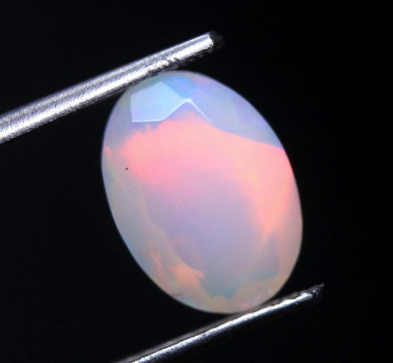 1.55 CT Ethiopian Welo Opal Gemstone: Faceted Oval Cut Opal Loose Stone, 10.20x7.40x5 MM