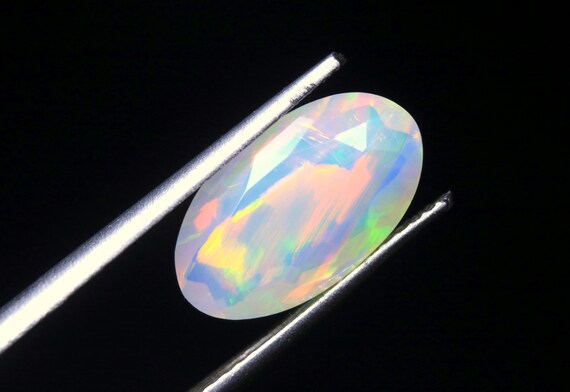 Natural Ethiopian Opal Gemstone: Oval Shape Multi Fire Welo Opal (2.05 CT)