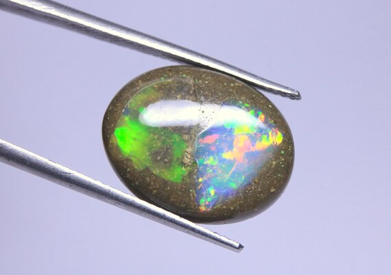 Ethiopian Welo Opal Cabochon: 5.30 Carat Multi Fire Boulder Opal Loose Gemstone For Jewelry