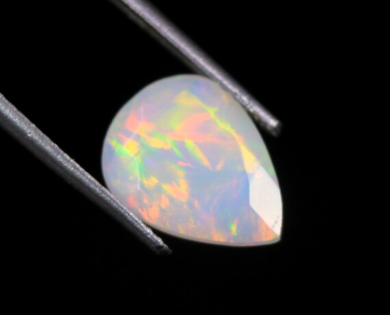 Faceted Welo Opal Gemstone: 2 CT Pear Shape Galaxy Fire Opal
