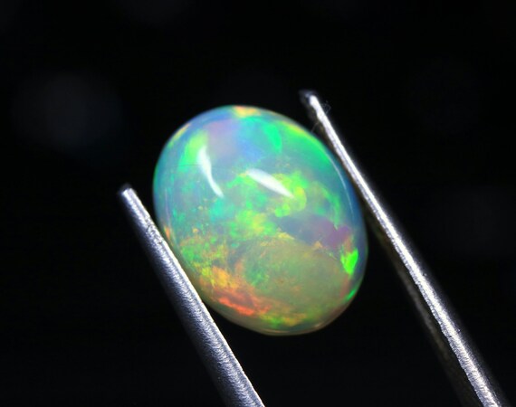 Ethiopian Opal Cabochon: 2.25 CT Oval Loose Gemstone, Play of Color (10.80x8.50x5 MM)