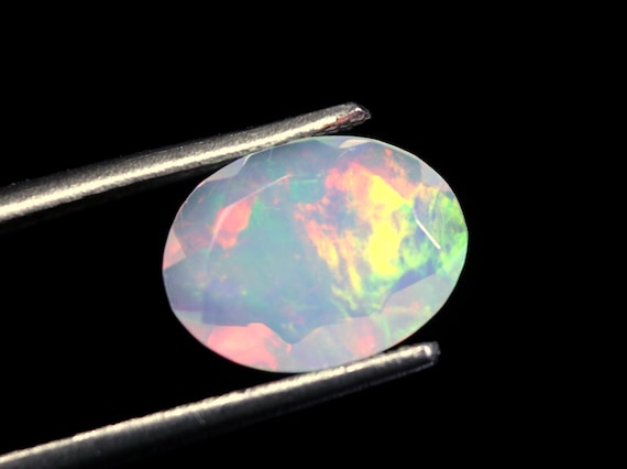 Natural Ethiopian Welo Opal Loose Gemstone: 1.00 CT Oval Faceted Galaxy Fire Opal Stone