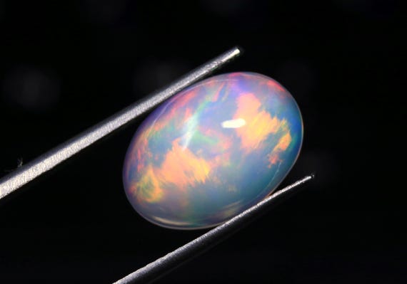Rainbow Ethiopian Welo Opal, Oval Cabochon Gemstone (4.60 CT, 14.50x10.30x6.50 MM)