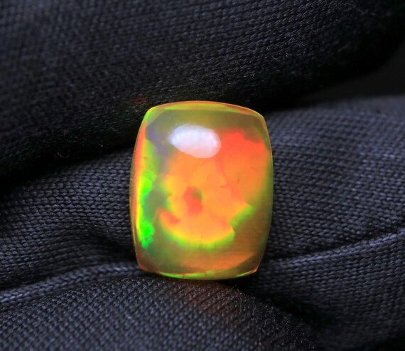 Welo Opal Cabochon: 2.45 CT Ethiopian Rainbow Fire Cushion Stone