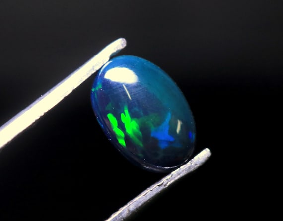 Ethiopian Black Opal Cabochon: 1.05 CT Oval Rainbow Welo Opal