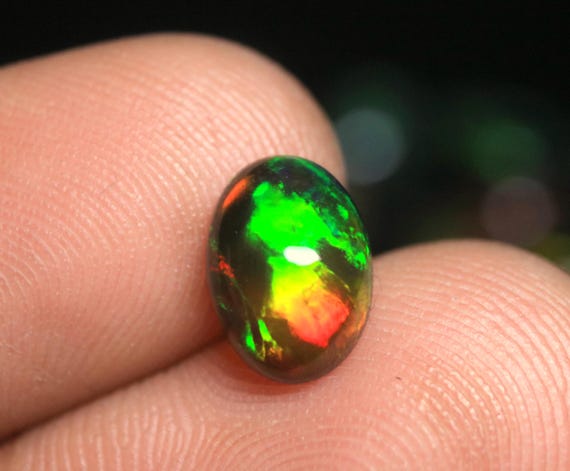 Black Ethiopian Welo Opal Loose Cabochon: 1.25 CT Oval Natural Fire Gemstone, 9.70x7x4 MM