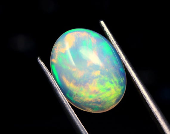 Ethiopian Opal Cabochon: 3.45 CT Oval Gemstone for Jewelry (14x11x4.80 MM)