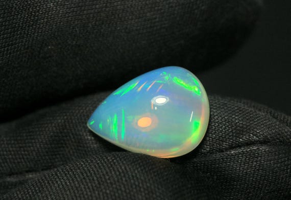 AAA Ethiopian Opal Cabochon: 4.75 CT Pear Shape Multi-Fire Gemstone