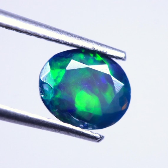 0.75 CT Ethiopian Welo Opal Gemstone, AAA Black Opal, Oval Cut
