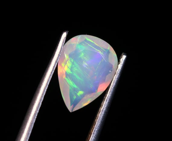 Faceted Ethiopian Fire Opal: 1.20 CT Pear Welo Gemstone