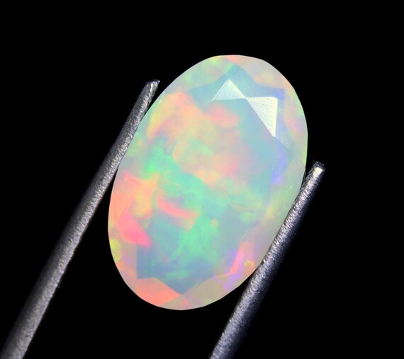 Faceted Ethiopian Opal Gemstone: 3.10 CT Oval Welo Opal