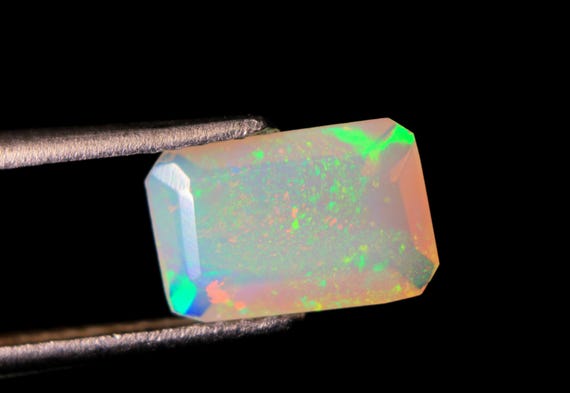 Faceted Ethiopian Opal Baguette: 1 CT Multi-Fire Gemstone