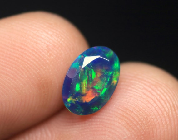 Faceted Black Opal Gemstone: 1.20 CT Ethiopian Welo Opal Birthstone For Jewelry (9.50x6.50x4.40 MM)