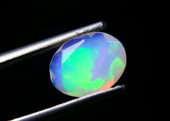 Natural Ethiopian Opal Gemstone: Oval Shape, 0.80 CT Multi Fire Welo Loose Stone
