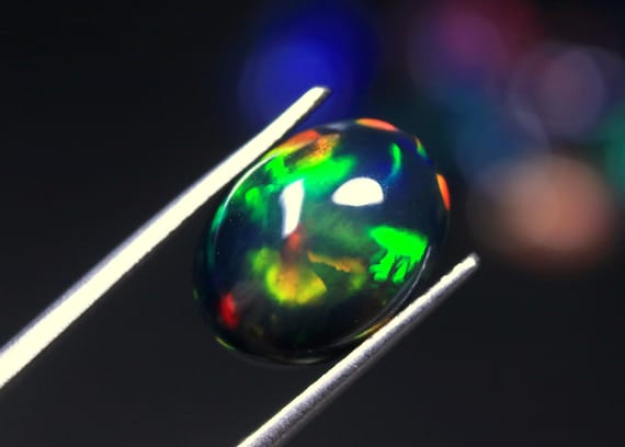 AAA Black Opal Cabochon, 3.40 CT Oval Ethiopian Gemstone (13x9.70x5.50 MM)