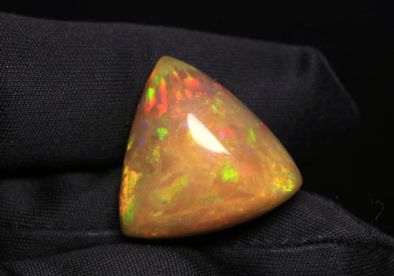 Trillion Ethiopian Welo Opal Cabochon, Multi Fire Brown Gemstone, 17.10 CT (21x20.50x10 MM)