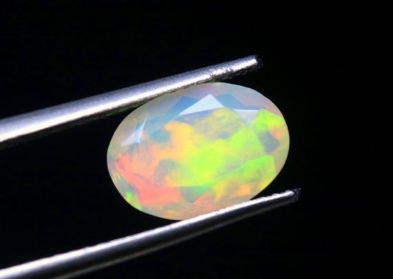 Natural Ethiopian Opal Gemstone: Oval Shape, 1.30 CT Multi Fire Welo Opal Stone