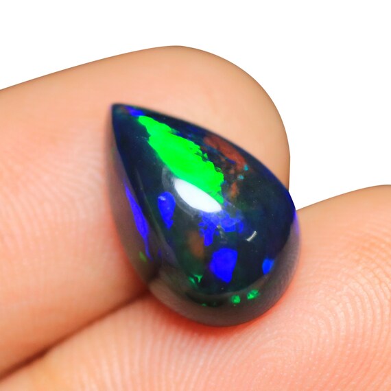 3.70 CT Pear Black Opal Cabochon: Welo Ethiopian Gemstone