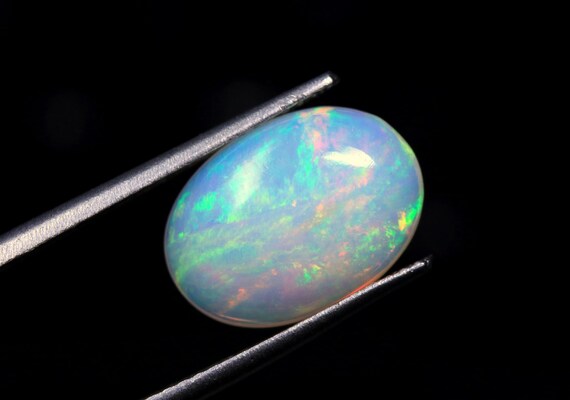 Ethiopian Welo Opal Gemstone, Rainbow Cabochon, October Birthstone (13x9.40x5 MM)