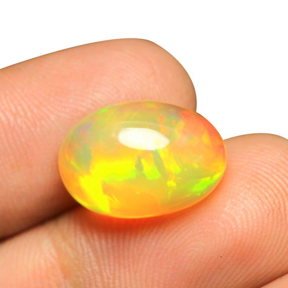 AAA Ethiopian Opal Cabochon: 7.65 CT Multi Fire Welo Gemstone (16x11x8 MM)