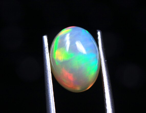 Ethiopian Welo Opal Cabochon: AAA Grade Natural Fire Opal Gemstone (9.80x7.50x5 MM)