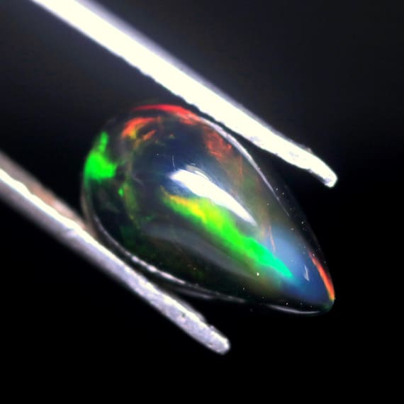 Welo Black Opal Pear Cabochon: 2.80 CT Multi Flashy Gemstone