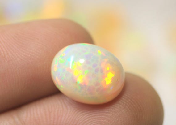 Multi Fire Ethiopian Opal Cabochon: 5.40 CT Oval Honeycomb White Opal Loose Gemstone