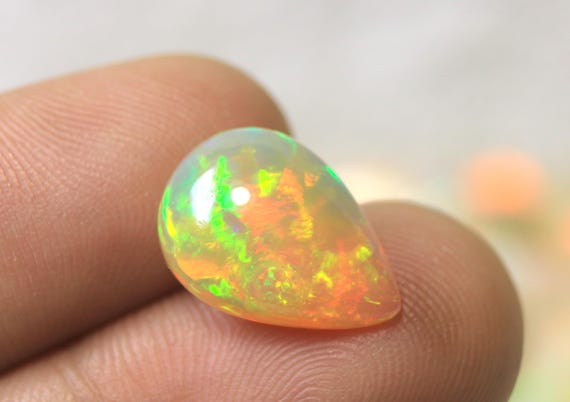 Natural Yellow Ethiopian Welo Opal Cabochon: 4.25 CT Pear Shape Opal Loose Gemstone