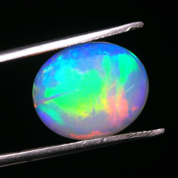 Natural Welo Opal Cabochon, Oval Shape, Multi Fire Gemstone (14.40x12x5.20 MM)