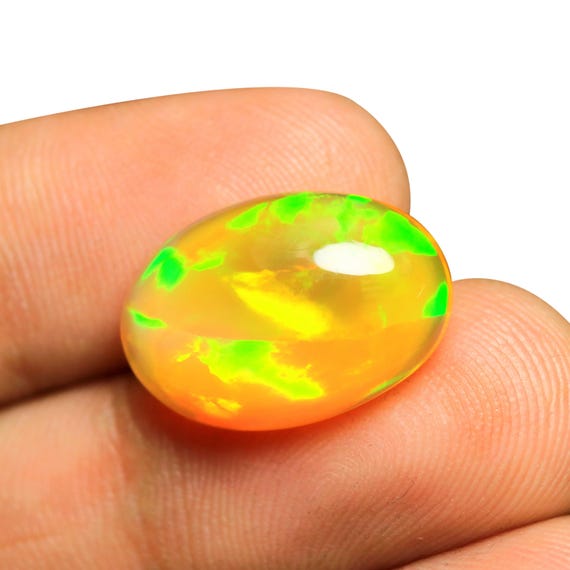 8.95 CT Oval Ethiopian Opal Cabochon: Multi Fire Flashy Gemstone