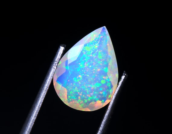 AAA Ethiopian Opal Gemstone: 1.20 CT Pear Faceted Welo Opal Loose Stone For Jewelry