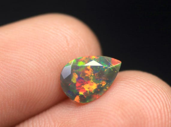 Faceted Black Opal Gemstone: 0.85 CT Ethiopian Welo Opal Stone For Jewelry (9.40x6.70x3.50 MM)