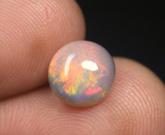 Ethiopian Welo Opal Cabochon: 1.60 CT Round Multi Fire Gemstone, 8.7x4 MM