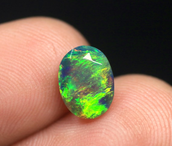 Oval Shape Black Opal Faceted Gemstone: 1.35 CT Ethiopian Welo Opal birthstone For Jewelry