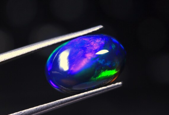 Flashy Ethiopian Black Opal Cabochon: AAA Grade Gemstone, 3.20 CT