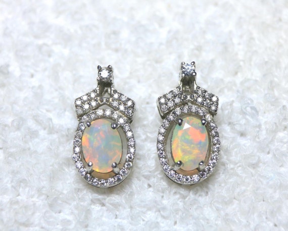Oval Cut White Opal Moissanite Sterling Silver Stud Earrings