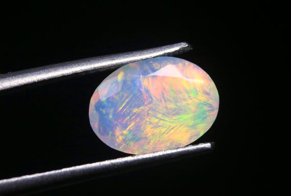 AAA+ Genuine Ethiopian Opal Faceted Cut Gemstone : 1.10 CT Natural Rainbow Fire Welo Opal