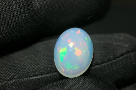 Ethiopian Opal Cabochon: 5.75 CT Oval Gemstone, AAA Grade