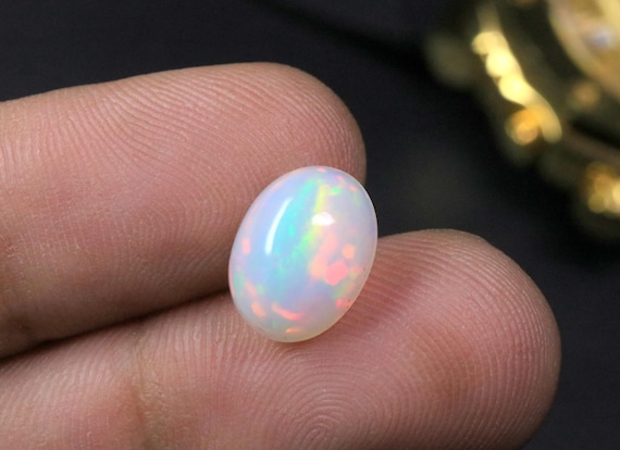 AAA Natural Oval White Opal Loose Gemstone, 2.50 Carat Ethiopian Opal Cabochon For Jewelry
