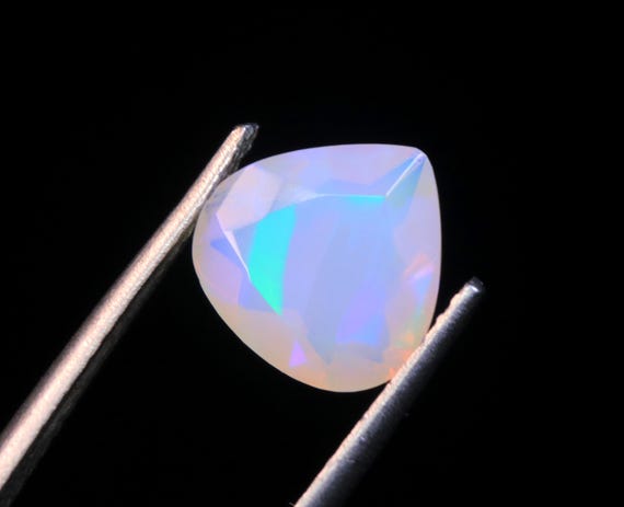 Faceted Ethiopian Welo Opal Gemstone: 1.50 CT Heart Shape, 9x9x4.70 MM