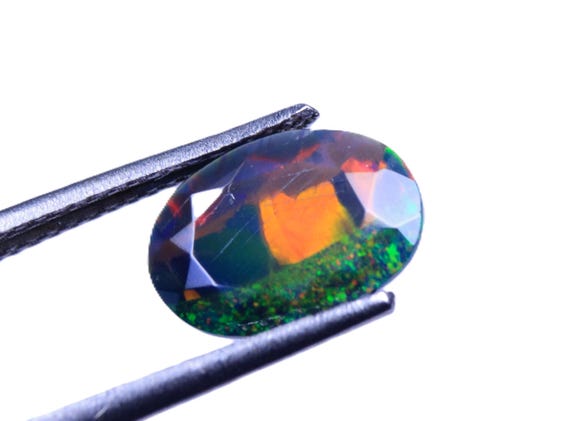 Welo Black Opal Gemstone, Oval Faceted Cut, Flashy Opal (10.40x7.40x3 MM)