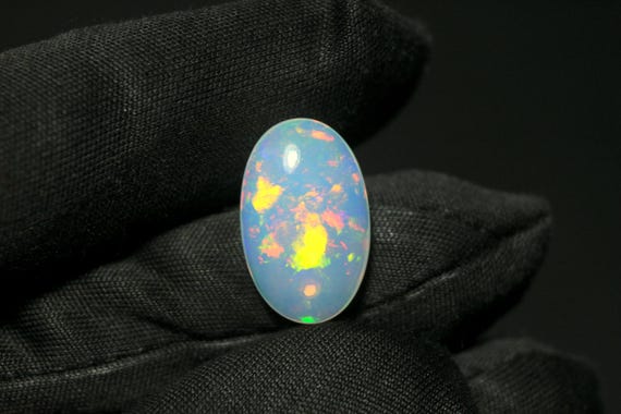 Ethiopian Fire Opal Cabochon: 4.35 CT AAA Grade Gemstone, 16.20x10.20x5.50 MM